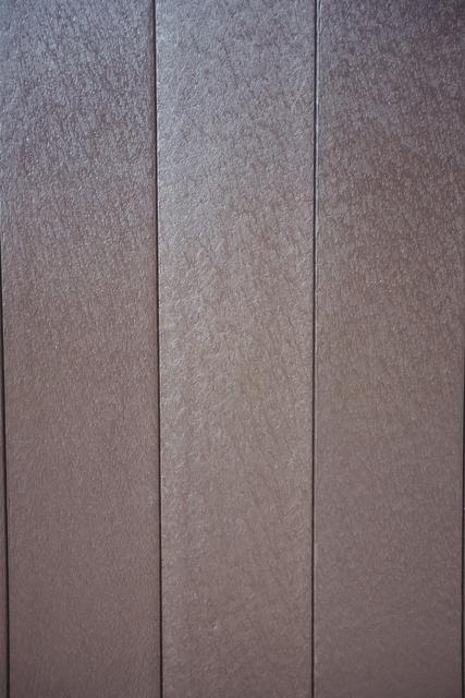 Close-up of vertical wooden panel background, full frame