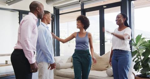 Dynamic business team engaging in office collaboration