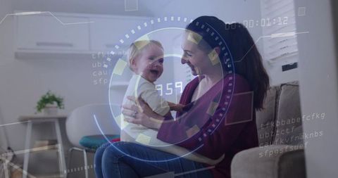 Mother cradling laughing infant with augmented reality hud overlay in modern living room
