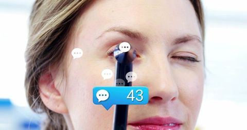 Woman squinting lifting stylus near face with floating chat bubbles and notification 43