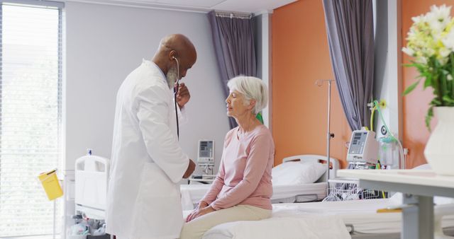 Doctor Checking Patient with Stethoscope in Hospital Room - Download Free Stock Images Pikwizard.com