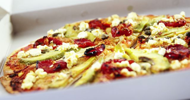 Close-Up of Vegetable Pizza with Feta Cheese in Box - Download Free Stock Images Pikwizard.com