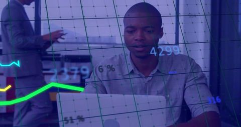 Businessman analyzing financial data on laptop for finance strategy