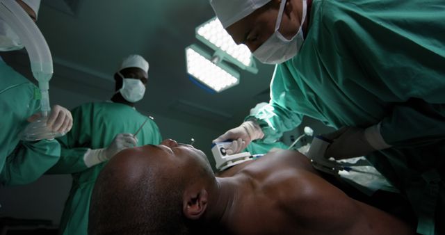 Team of Surgeons Performing Critical Surgery in Operating Room - Download Free Stock Images Pikwizard.com