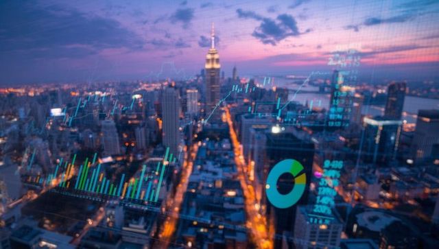 New York City Skyline with Financial Data Overlay at Dusk