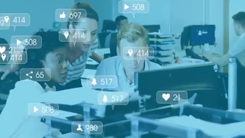 Diverse Team Analyzing Social Media Engagement Metrics on Office Screens