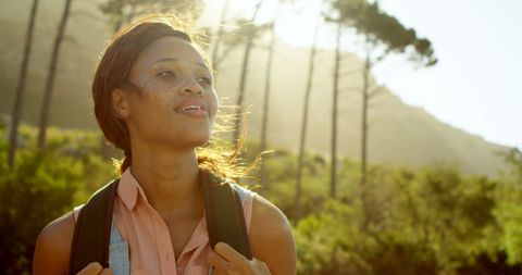 Young Woman Embracing Nature on a Sunny Hike Outdoor Adventure - Download Free Stock Images Pikwizard.com