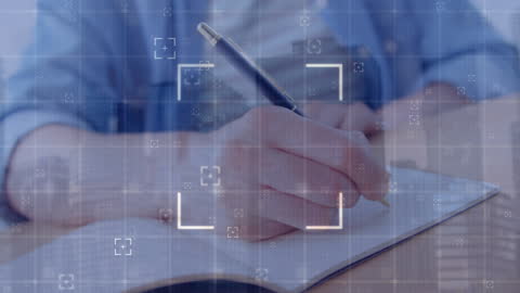 Businessman Analyzing Data with Notebook in Modern Office