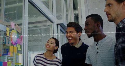 Diverse Team Brainstorming Creative Ideas in Modern Office Space