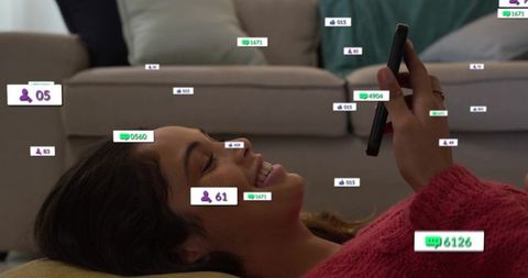 Smiling Woman Engaged with Smartphone in Cozy Living Room