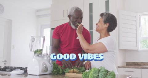 Senior Couple Enjoying Fresh Cooking Together in Kitchen