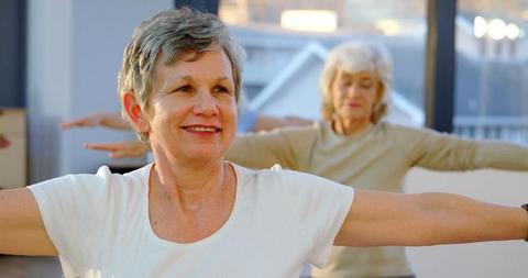 Senior Women Practicing Yoga Indoors and Stretching Arms - Download Free Stock Images Pikwizard.com