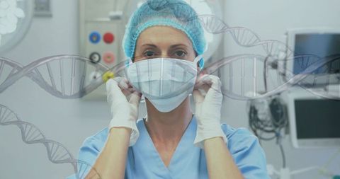 Surgeon adjusting mask in or with dna strands overlay signaling genomics and modern surgical care