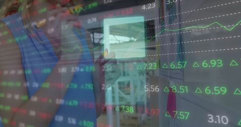 Caucasian Businesswoman Analyzing Financial Chart in Office