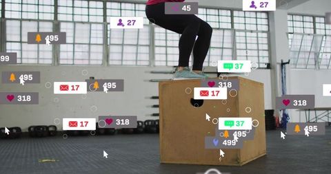 Woman balancing on plyo box during functional fitness with floating social media icons