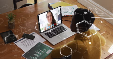 Woman Engaging in Virtual Science Meeting with Molecular Graphics