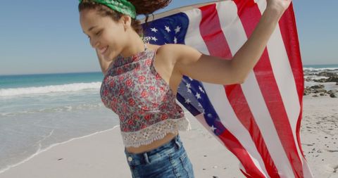 Joyful Woman with American Flag at the Beach - Download Free Stock Images Pikwizard.com