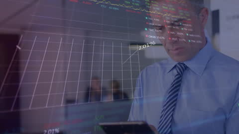 Business Professional Analyzing Stock Market Data on Tablet