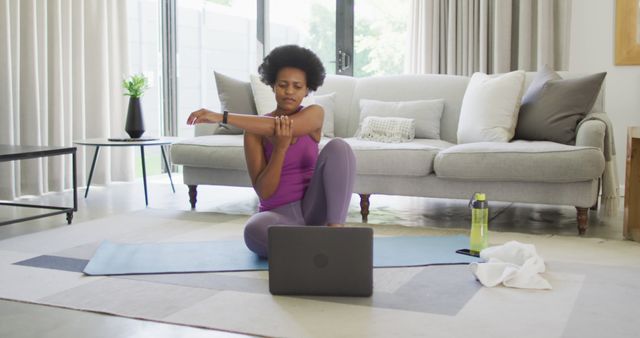 Woman Stretching Before Virtual Yoga Class at Home - Download Free Stock Images Pikwizard.com