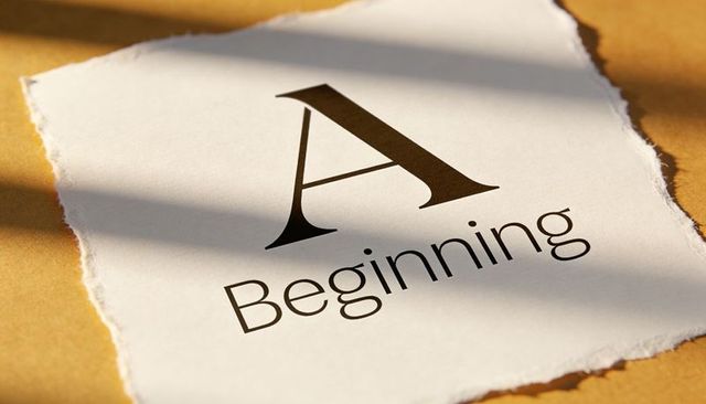 Elegant letter a beginning on torn paper with warm shadowed texture and ragged edge