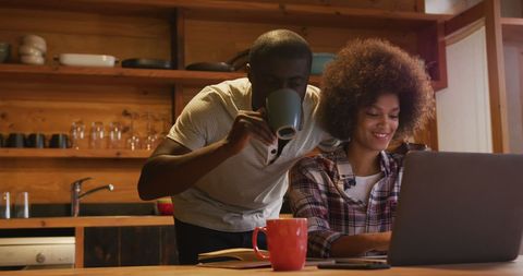 Collaborative home work session with young couple