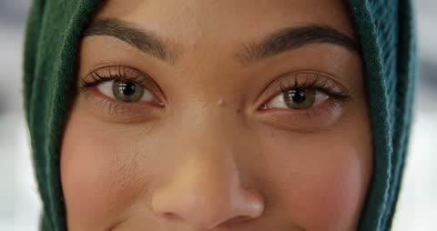 Confident Professional Woman in Hijab Networking Business Scene