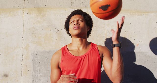 Focused Young Athlete Practicing Basketball Outdoors - Download Free Stock Images Pikwizard.com