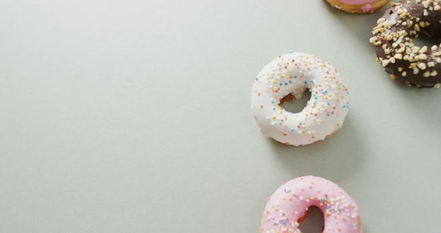 Colorful Donuts with Sprinkles on Light Background - Download Free Stock Images Pikwizard.com