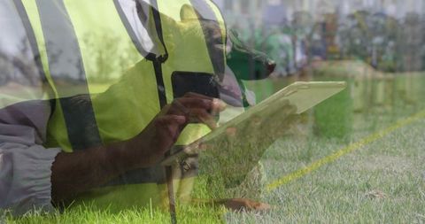 Responder teamwork: handler and german shepherd use technology in field