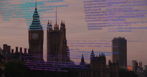 Showcasing elizabeth tower and gothic parliament at dusk with coding overlay on glass