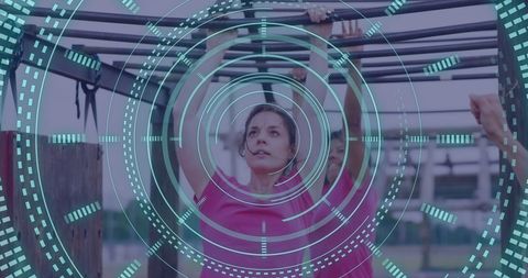 Women Training on Obstacle Course with Digital Overlay