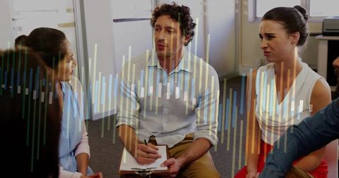 Facilitator Leading Team Discussion with Data Overlay