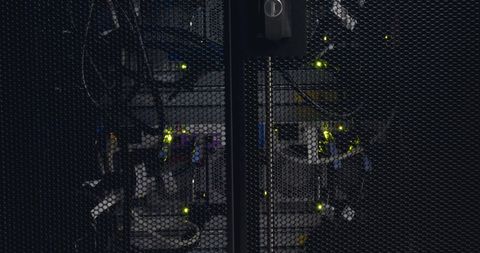 Close-up view of computer server lights in operation