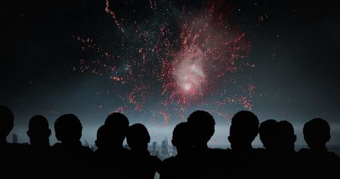 Silhouetted Crowd Watching Fireworks Over Cityscape Night Sky - Download Free Stock Images Pikwizard.com