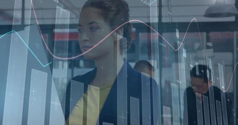 Businesswoman Analyzing Digital Financial Graphs in Modern Office