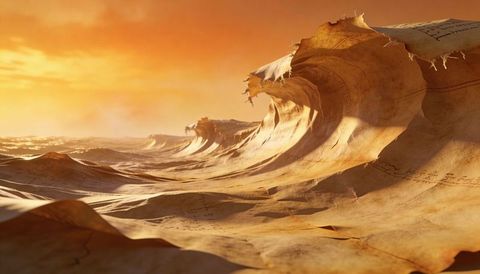 Surreal golden parchment waves rolling into textured paper ocean at sunset