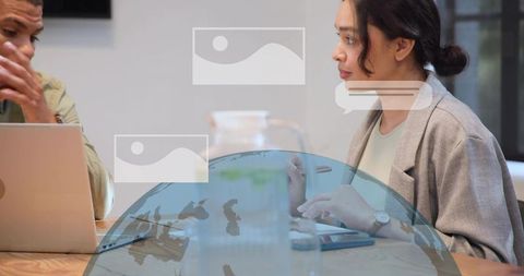 Woman explaining strategy during team meeting with digital ui overlays and globe graphic