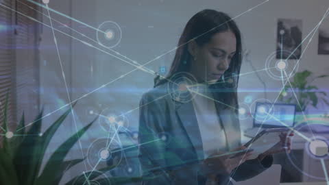 Digital Network Concepts with Businesswoman Holding Tablet