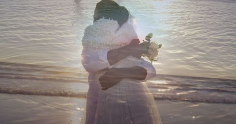 Romantic Beach Wedding, African American Couple Joyfully Hugging - Download Free Stock Images Pikwizard.com