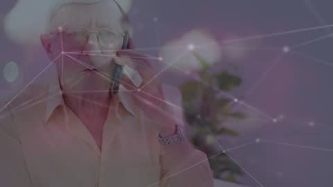 Elderly Man Talking on Smartphone with Digital Network Overlay