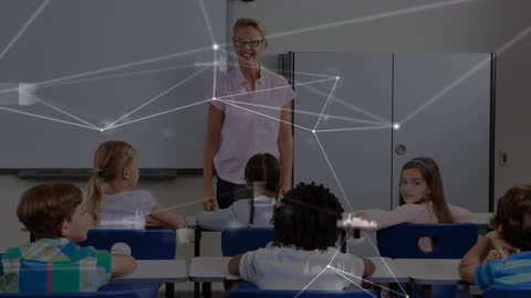 Teacher Engaging with Students in Tech-Enabled Classroom Setting