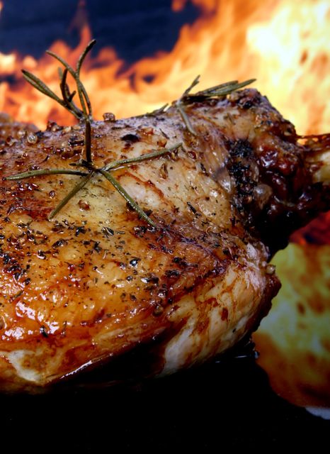 Grilled Juicy Pork Chop with Rosemary in Front of Flames - Download Free Stock Photos Pikwizard.com