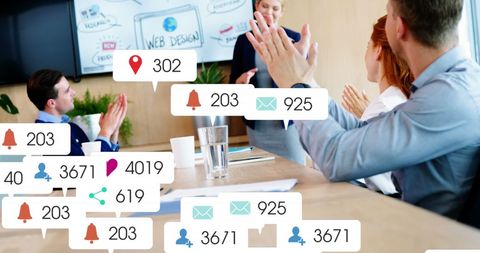 Team Analyzing Social Media Data in Modern Office Meeting