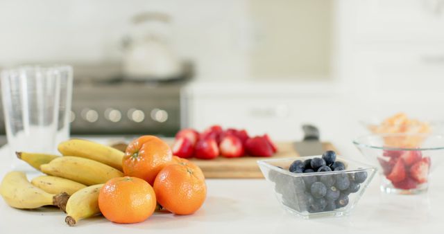 Fresh Assorted Fruits on White Kitchen Counter - Download Free Stock Images Pikwizard.com