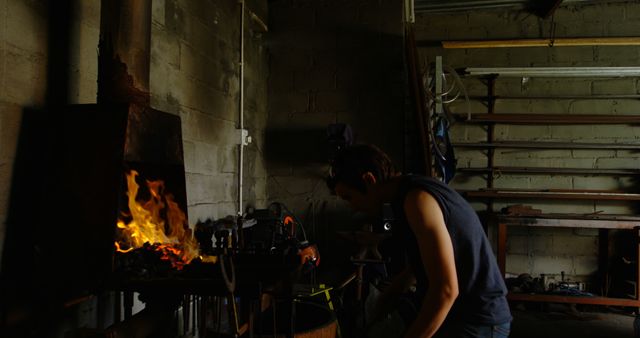 Blacksmith Working with Forge Fire in Workshop - Download Free Stock Images Pikwizard.com