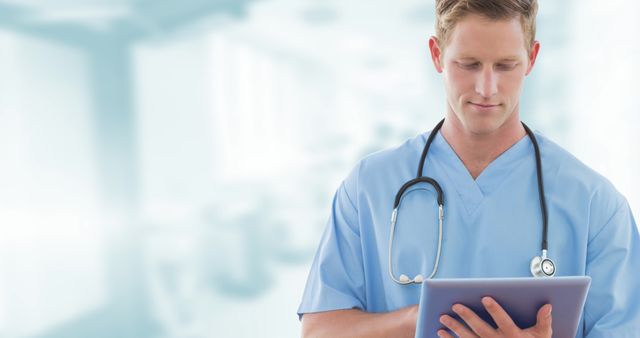 Male Nurse Using Digital Tablet in Hospital Corridor - Download Free Stock Images Pikwizard.com