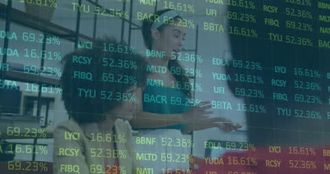 Teamwork in Office Analyzing Financial Market Trends