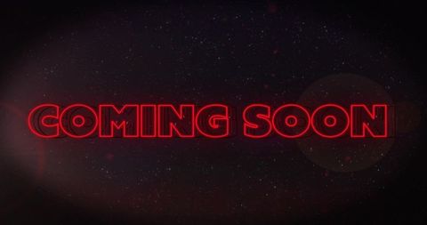 Glowing red neon coming soon text over cosmic starfield with lens flare