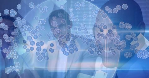 Business Professionals Analyzing Digital Interfaces for Data Insights