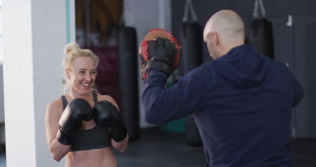 Female Boxer's Training Session with Coach in Gym - Download Free Stock Images Pikwizard.com